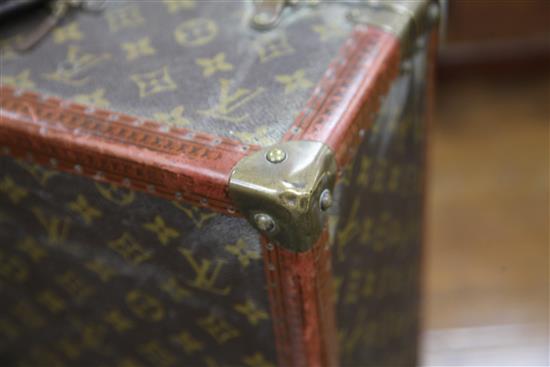 A Louis Vuitton travel case, 19.75 x 14.5 x 7in.